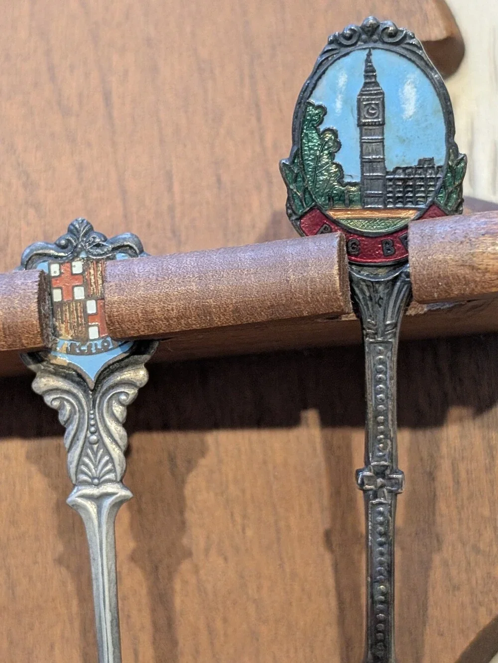 Vintage Decorative Souvenir Spoon Set on Wooden Display